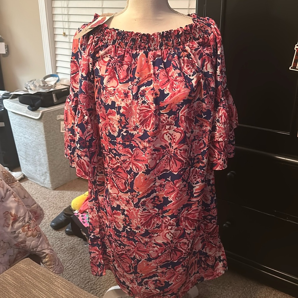 Dress misses size S/M pink shades/purplish navy blue print 100% polyester.